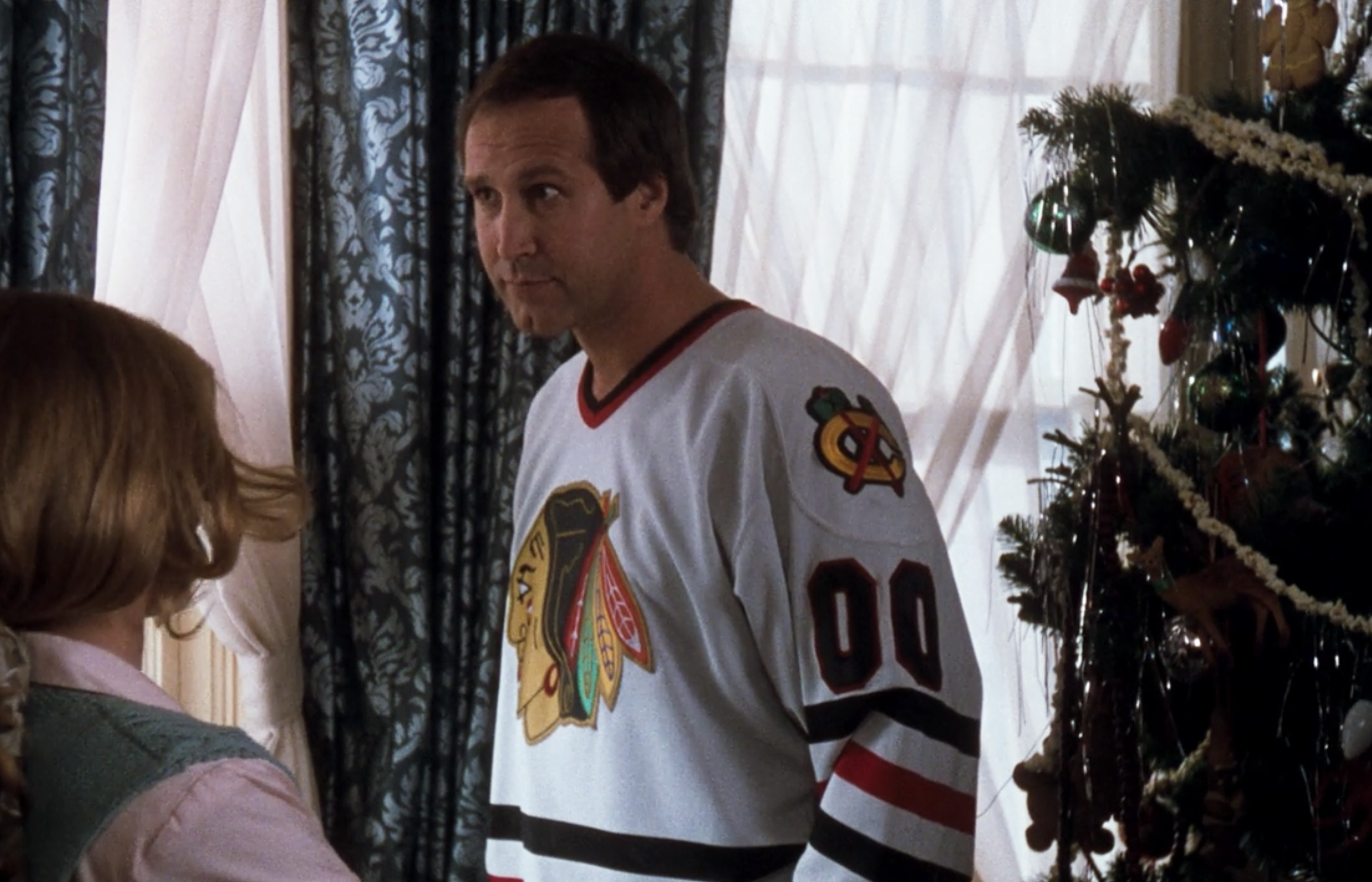 CHEVY CHASE SIGNED CLARK GRISWOLD BLACKHAWKS CHRISTMAS VACATION JERSEY PSA  MED